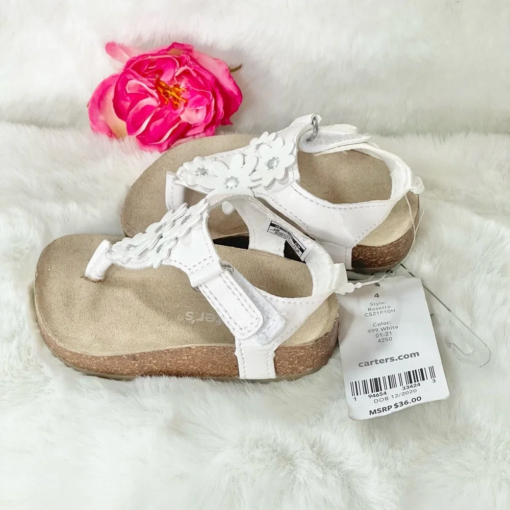 New with tags CARTER’S Toddler’s white Sandals with White Floral Design. Velcro